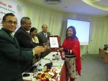 Ms. Nomita Akter Mukti receiving crest on behalf of honourable MP